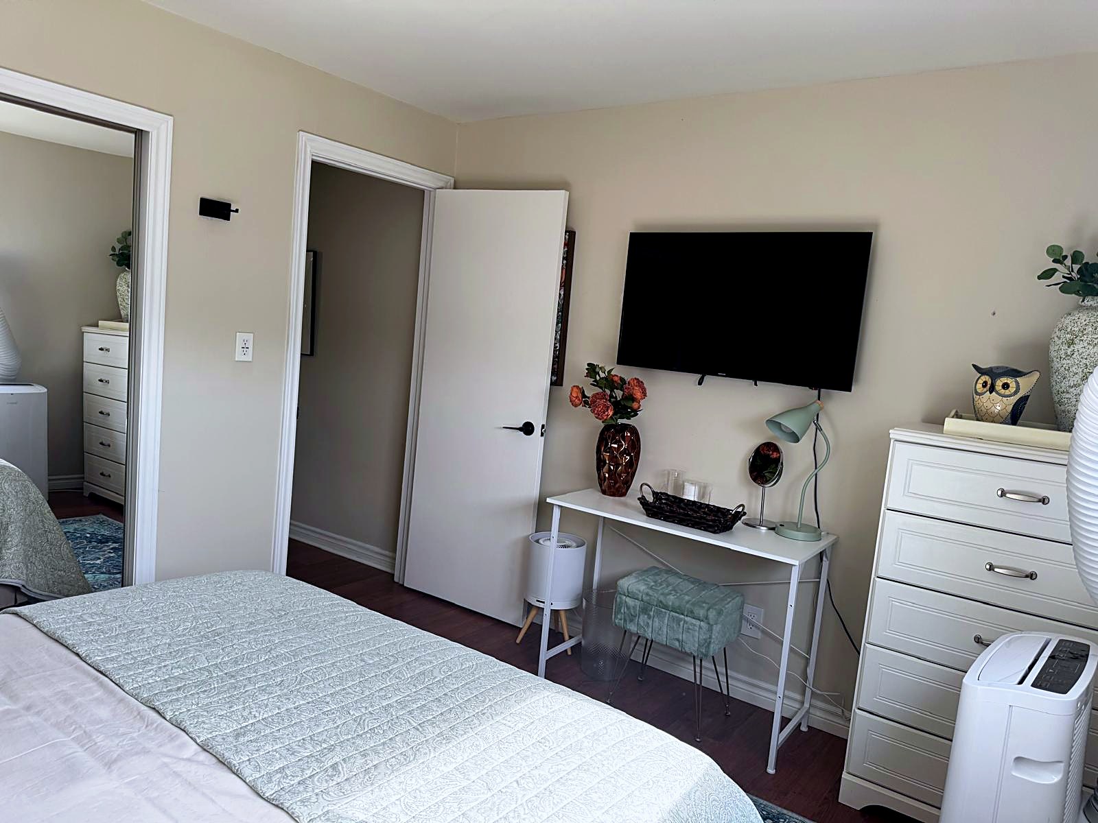 Bedroom 2 — smart TV & desk